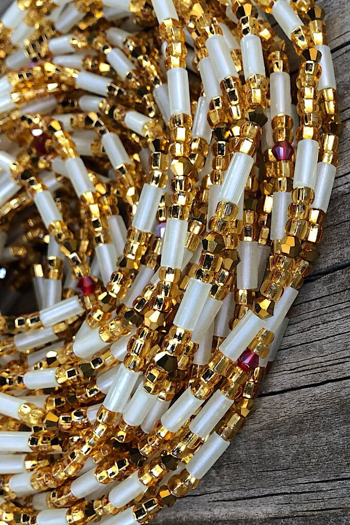 white and gold glow in the dark waist beads